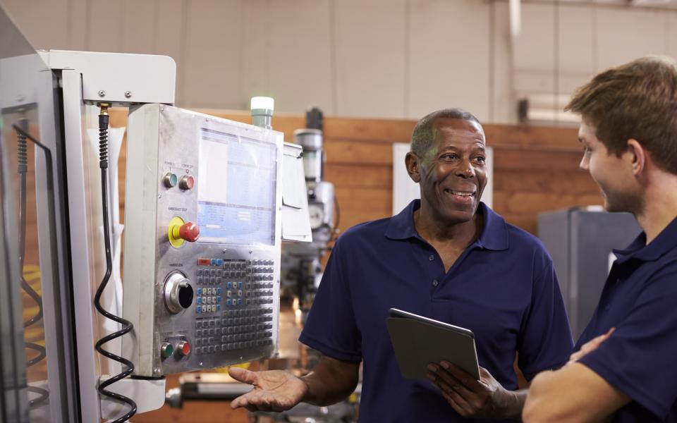 Engineer Training Male Apprentice On CNC Machine Istock 628110926 Copy